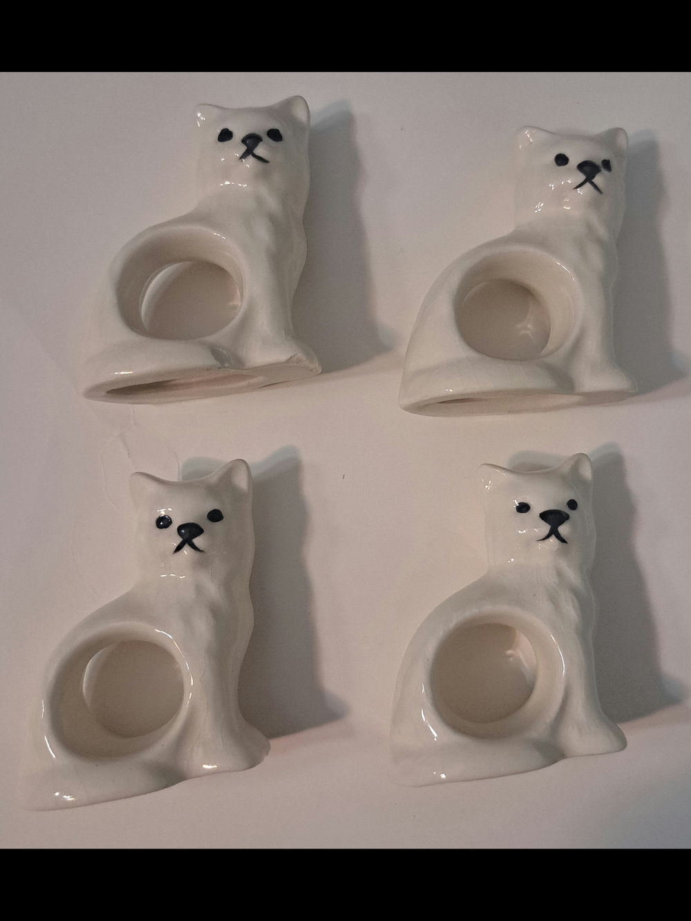Vintage White Ceramic Porcelain Cat Napkin Rings - Set of 4 One Has Small Chip.